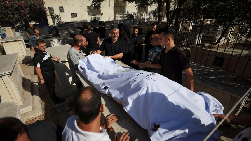 Mourners attend the burial of Palestinian Christians Saad Salama and Foumia Ayyad at St. Porphyrius Greek Orthodox Church in Gaza July 17, 2025. The two parishioners were killed, according to medics, in an Israeli strike on the Holy Family Parish's compound. (OSV News photo/Dawoud Abu Alkas, Reuters)