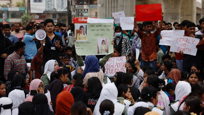 Caption: Students hold placards and pictures of a victim as they protest  July 22, 2025, demanding the actual number of the death toll after an air force training aircraft crashed into a building belonging to Milestone School and College in Dhaka, Bangladesh July 21. (OSV News photo/Mohammad Ponir Hossain, Reuters)