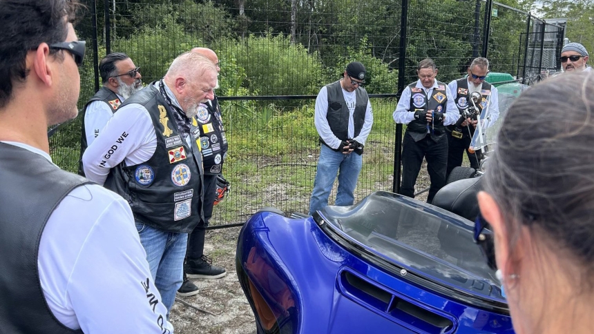 Archbishop Thomas G. Wenski of Miami and Knights on Bikes pray the rosary for detainees at the entrance to Alligator Alcatraz, a controversial immigration detention facility in some 55 miles from Miami in the Florida Everglades, July 20, 2025. (OSV News photo/Archbishop Thomas G. Wenski)