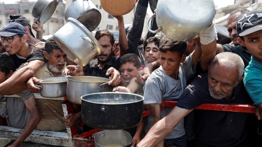 Palestinians gather to receive food from a charity kitchen amid a hunger crisis in the central Gaza Strip July 29, 2025. (OSV News photo/Hatem Khaled, Reuters)