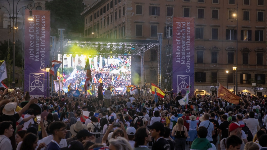 Young people attend a concert in Risorgimento Square in Rome July 29, 2025, during the Jubilee of Digital Missionaries and Catholic Influencers. The event featured live music, dancing and international flags, with a large screen broadcasting images from earlier moments in the celebration. (CNS photo/Pablo Esparza)
