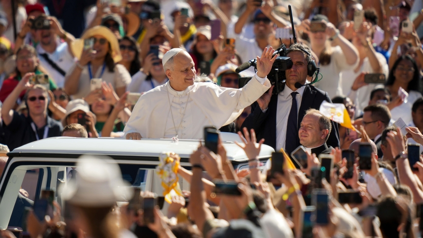 Pope Leo XIV greets visitors and pilgrims from the popemobile as he rides around St. Peter's Square at the Vatican before his weekly general audience July 30, 2025. (CNS photo/Lola Gomez)