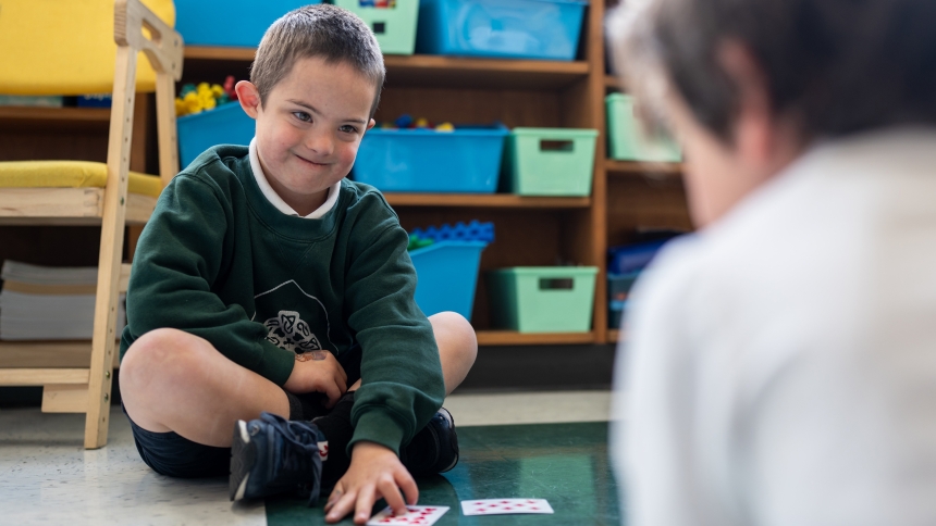 Aloysius Ford, who has Down syndrome, and kindergarten classmate Pierce Donohue play "Go Fish" during class at St. Patrick Catholic School in Tacoma, Wash., May 21, 2025. (OSV News photo/Stephen Brashear)