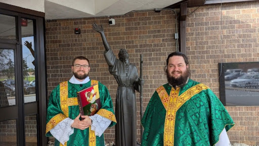 Father Greg Bim-Merle and Deacon O'Donnell with the statue of St. James the Less before his last Sunday Mass of the summer. (Provided photo)