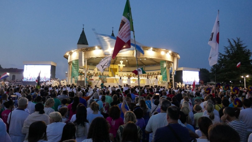 Young people and others gather for prayer behind the Church of St. James in Medjugorje, Bosnia-Herzegovina, in this file photo from the 2024 international youth festival known as Mladifest. Pope Leo XIV sent a message to this year's festival, which is being held Aug. 4-8, 2025. (CNS photo/Courtesy Mladifest)