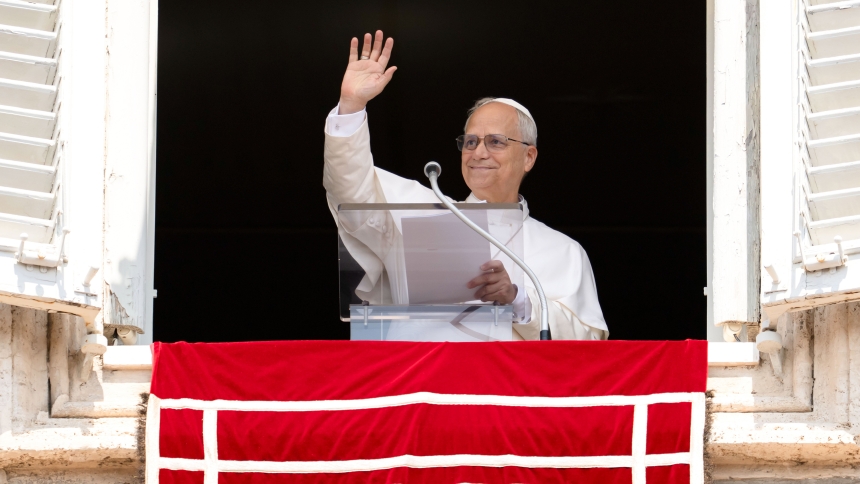 Pope Leo XIV greets people gathered in St. Peter’s Square at the Vatican for the recitation of the Angelus prayer Aug. 10, 2025. (CNS photo/Vatican Media)