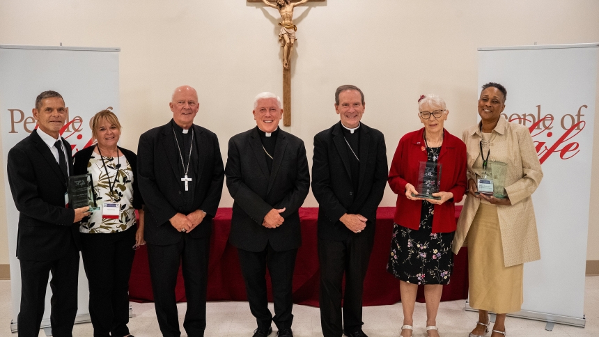 Bishop Chad W. Zielinski of New Ulm, Minn., third from left, Bishop Daniel E. Thomas of Toledo, Ohio, and Bishop Michael F. Burbidge of Arlington, Va., chairman of the U.S. Catholic bishops' Committee on Pro-Life Activities, are pictured with the "People of Life" recipients in Arlington Aug. 11. Pictured are Daniel Marker, and Susan Young, receiving posthumously for their parents Mike and Rita Marker of Steubenville, Ohio, Judy Haag of Eden Valley, Minn., and Valerie Washington of Baltimore, executive direc