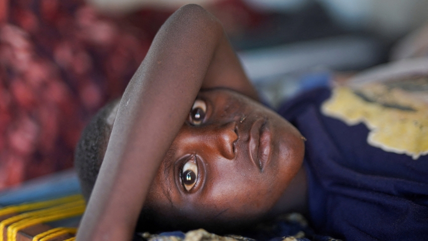 A young Sudanese cholera patient lies on a bed at a United Nations-run makeshift clinic in the town of Tawila in north Darfur, Sudan, Aug. 5, 2025. (OSV News photo/Mohammed Jamal, Reuters)