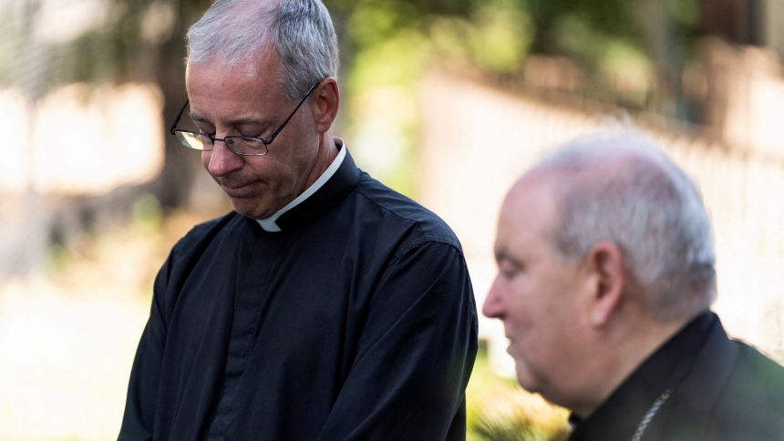 Father Dennis Zehren, pastor of Annunciation Church in Minneapolis, becomes emotional as he speaks to the media alongside Archbishop Bernard A. Hebda Aug. 30, 2025, about the recent shooting at the church. The shooter opened fire through the windows of the school's church and struck children attending Mass Aug. 27 during the first week of school, killing two and wounding 21 others. (OSV News photo/Tim Evans, Reuters)