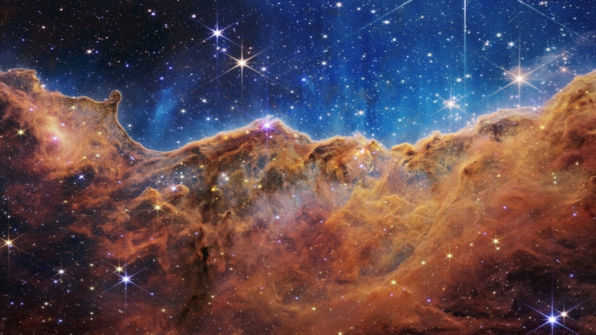 The "Cosmic Cliffs" of the Carina Nebula are seen in an image released by NASA July 12, 2022. The image is from data provided by NASA's James Webb Space Telescope, a revolutionary apparatus designed to peer through the cosmos to the dawn of the universe. (OSV News photo/NASA, ESA, CSA, STScI, Webb ERO Production Team, Handout via Reuters)