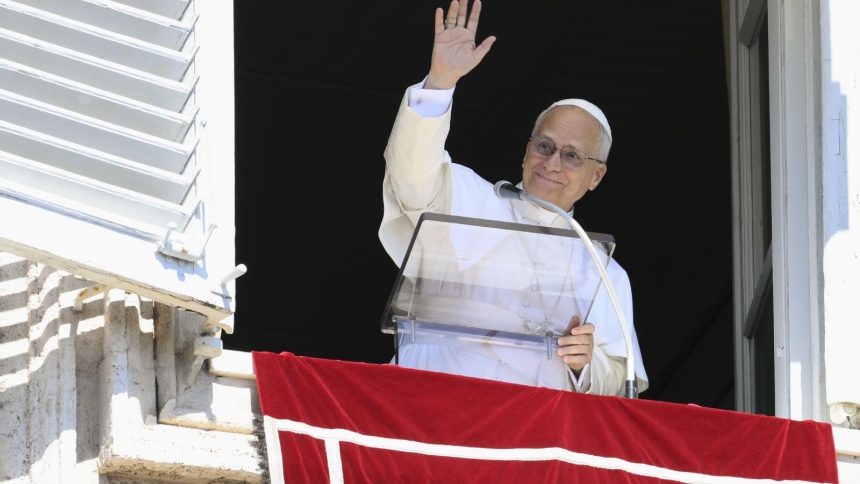 Pope Leo XIV waves to the crowd gathered in St. Peter's Square at the Vatican to pray the Angelus with him Sept. 21, 2025. (CNS photo/Vatican Media)