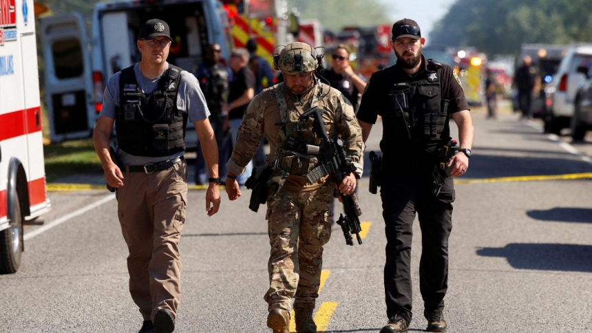 Emergency personnel work at the scene of a shooting at the Church of Jesus Christ of Latter-day Saint in Grand Blanc, Mich., Sept. 28, 2025. A gunman opened fire inside the church during a Sunday service and set the building ablaze, killing at least four people and injuring at least eight others. Police shot and killed the suspect, authorities said. (OSV News photo/Rebecca Cook, via Reuters)