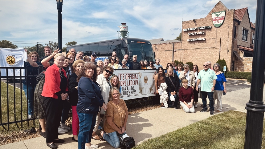 Pilgrims stand outside Aurelio's