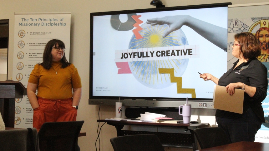 How to be “Joyfully Creative” in ministry was the topic on Sept. 6 as Vicky Hathaway (left) and Lisa Curley of the Missionary Discipleship and Evangelization Team welcomed lay leaders from several parishes to a Conversations in Hospitality program at the Pastoral Center in Merrillville. Hathaway used images from Sister Corita Kent’s artwork to enhance her presentation. (Marlene A. Zloza photo)