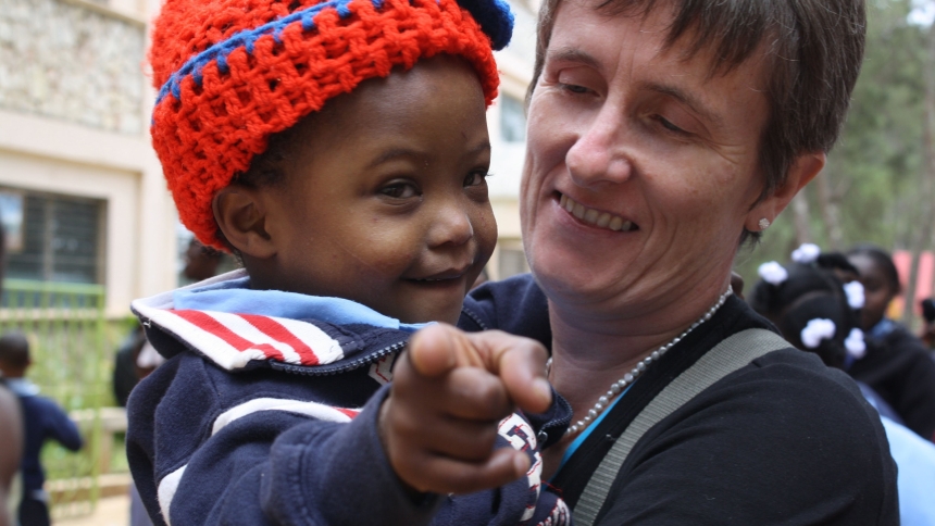 Gena Heraty, a longtime Irish missionary in Haiti pictured with a child in a 2012 photo, has been freed after nearly a month of captivity, the news agency Agenzia Fides confirmed Sept. 1, 2025. Heraty was among several people -- including a 3-year-old child -- taken in the early hours of Aug. 3 after gunmen breached the Saint-Hélène orphanage in Kenscoff, near Haiti's capital of Port-au-Prince. (OSV News photo/courtesy NPH International)