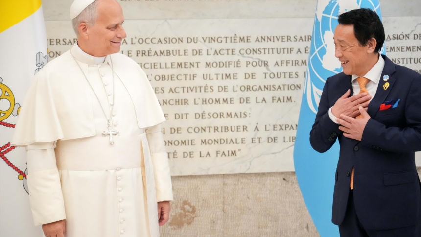 Pope Leo XIV greets Qu Dongyu, director-general of the U.N. Food and Agriculture Organization, before addressing government leaders during a ceremony marking the agency’s 80th anniversary at its headquarters in Rome Oct. 16, 2025. (CNS photo/Lola Gomez)