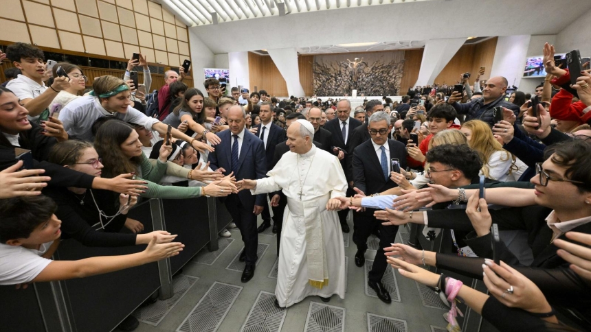 Pope Leo XIV greets students in the Paul VI Audience Hall at the Vatican Oct. 30, 2025, as part of the Jubilee of the World of Education. (CNS photo/Vatican Media)