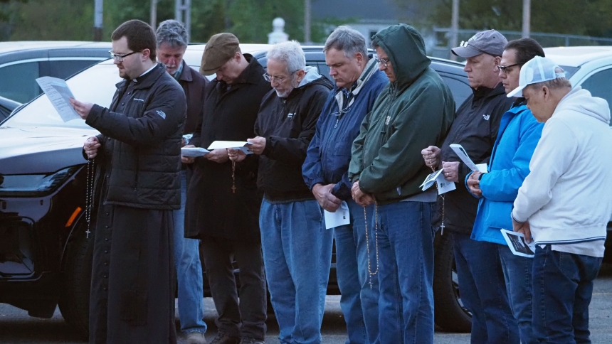 Caption: A group of nearly 20 diocesan faithful taking part in the rosary/prayer vigil on the eve of the execution of Benjamin Donnie Ritchie in May 2025 at Indiana State Prison. (Deacon Bob Wellinski photo)