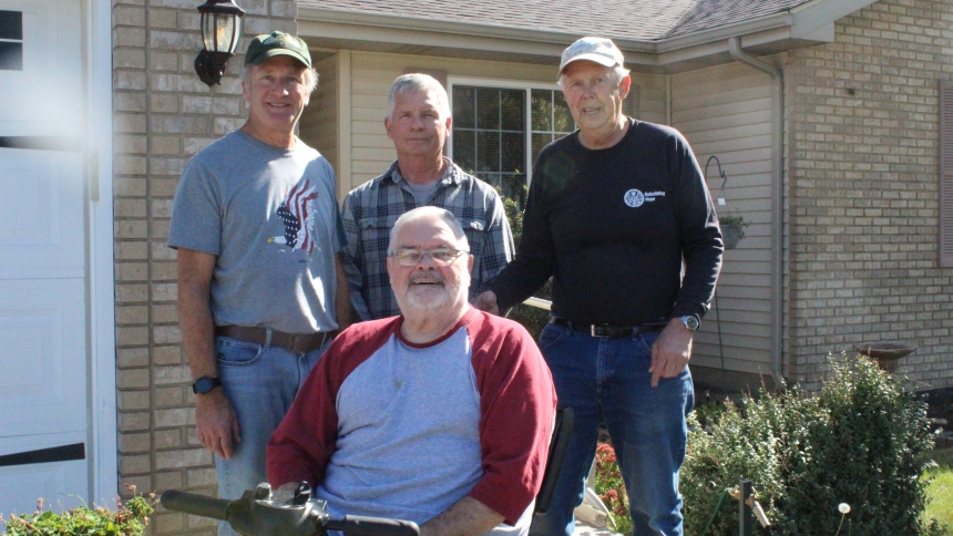 Homeowner Bill Greenfield, the 100th recipient of a lifechanging ramp from the St. Michael Wheelchair Ramp Ministry, thanks the three ministry volunteers, (from left) Deacon Tom Kubik, Rick Besich and ministry leader Jim Koeling. “This ramp gives my wife and I freedom, the ability to get out of the house, and offers us safety in case of a fire or other emergency,” said Greenfield. (Marlene A. Zloza photo)