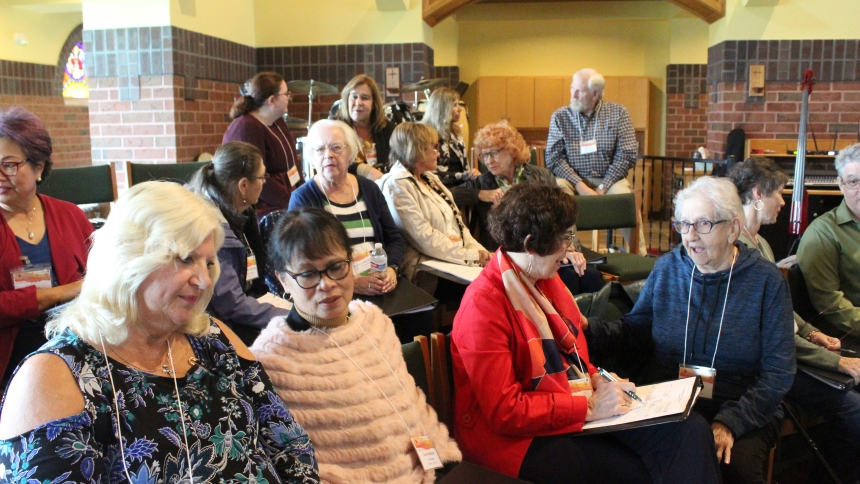 Music Ministry members (front row from left) Arlene Biocic, Lorna Nietzel, Mary Cusic and Jan Koble, all from St. Edward in Lowell, pair up to "share their story and their goals for their music ministry during their specific Liturgical Conference '23 session on Oct. 28 at St. Michael the Archangel in Schererville. "We want to share our witness when we sing," explained co-presentor Allson Powell, director of music at St. John the Evangelist in St. John. (Marlene A. Zloza photo)