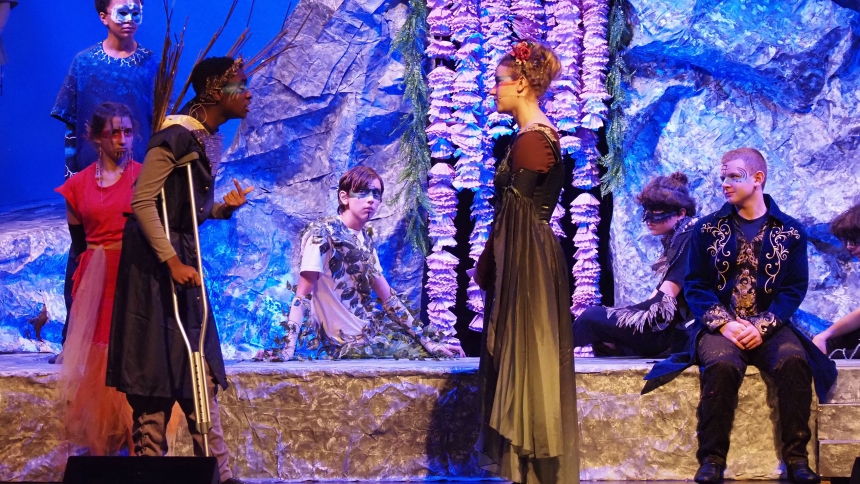 Marquette Catholic High School performing arts students Chris Lawhorn (Oberon) and Ella Crane (Titania) exchange lines during a scene of “A Midsummer Night’s Dream” on Nov. 13. (Deacon Bob Wellinski photo)