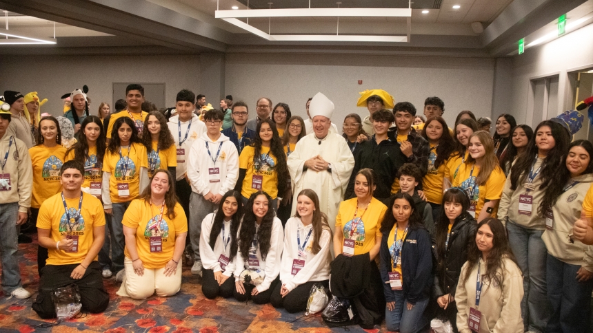 Bishop Noll students with Bishop McClory after the Diocesan Mass
