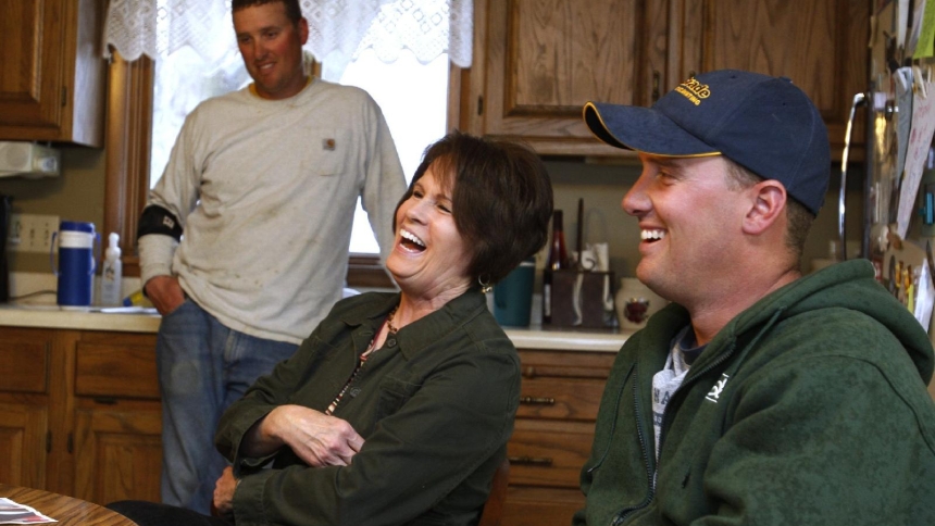 A Catholic family is pictured in a file photo sharing a laugh at their farm in Epworth, Iowa. (OSV News photo/Bob Roller)