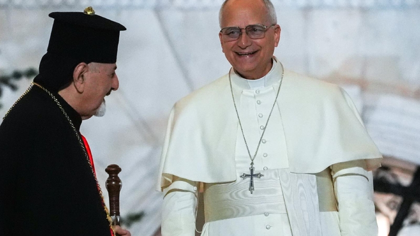 Pope Leo XIV smiles as he meets with Lebanese young people gathered at the square in front of the Maronite Patriarchate of Antioch in Bkerké, Lebanon, Dec. 1, 2025. (CNS photo/Lola Gomez)