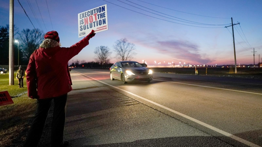 A file photo shows an activist against the death penalty protesting along a road outside the United States Penitentiary in Terre Haute, Ind., Jan. 12, 2021. On Dec. 3, 2025, a coalition of more than 50 organizations from across the country announced the formation of a new alliance called the U.S. Campaign to End the Death Penalty to unite behind a national strategy to end capital punishment in the United States. (OSV News photo/Bryan Woolston, Reuters)