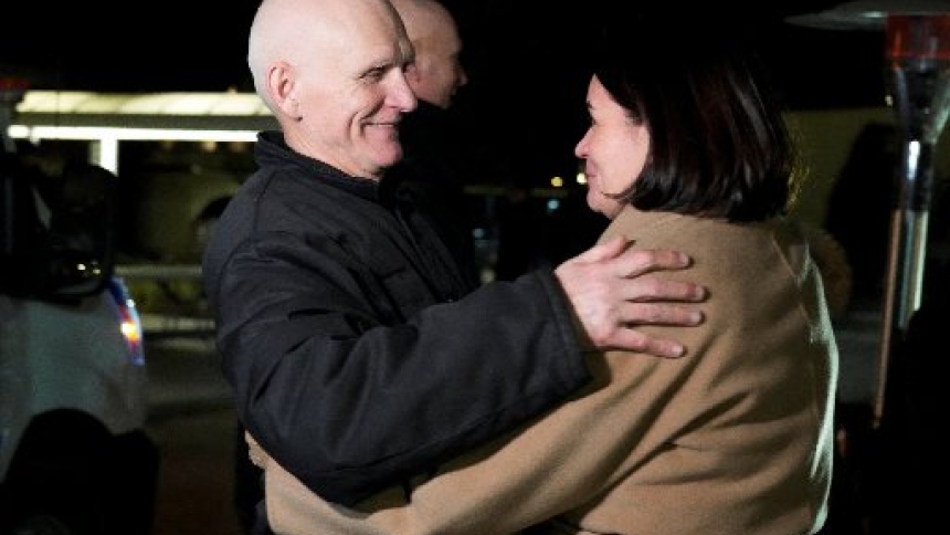 Belarusian opposition leader Sviatlana Tsikhanouskaya, right, welcomes Ales Bialiatski, a political prisoner released from Belarus, as he arrives at the U.S. embassy in Vilnius, Lithuania Dec. 13, 2025. Bialiatski is a Catholic and the 2022 Nobel Peace Prize laureate. (OSV News photo/Ints Kalnins, Reuters)