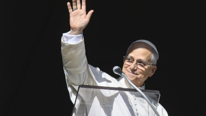Pope Leo XIV greets visitors in St. Peter's Square at the Vatican as they gather to pray the Angelus prayer on the feast of the Holy Family, Dec. 28, 2025. (CNS photo/Vatican Media)