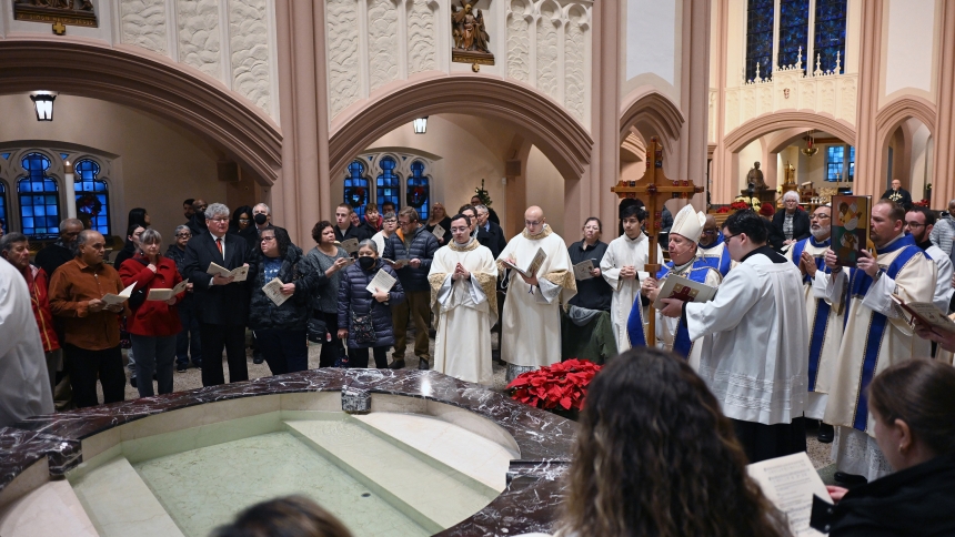 Faithful from across the diocese gather for an indoor procession leading to the baptismal font at the Cathedral of the Holy Angels in Gary on Dec. 29 to celebrate the anticipation of the Jubilee Year 2025. The Catholic Church recognizes the 2,025th anniversary of the Incarnation of Our Lord and dioceses around the nation will commence efforts of "great spiritual, ecclesial and social significance in the life of the Church," according to the United States Conference of Catholic Bishops. (Anthony D. Alonzo ph
