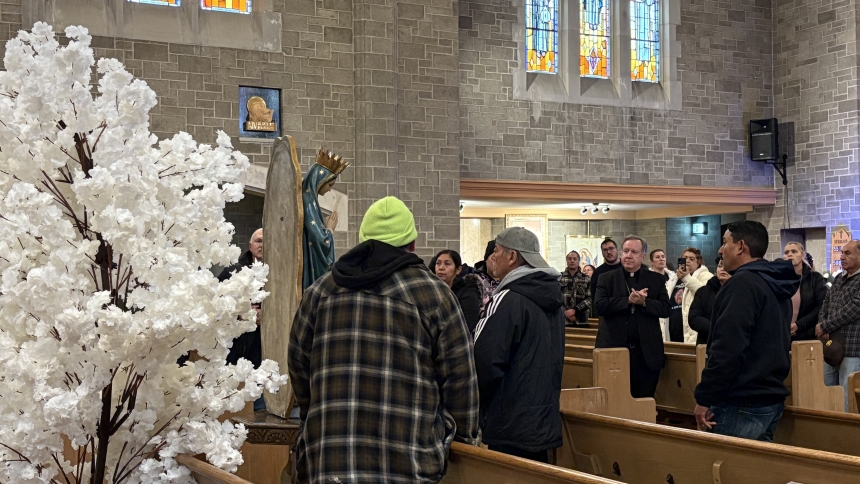 The congregation at St. Joseph the Worker in Gary serenades a historic statue of Our Lady of Guadalupe on Nov. 30, following the annual procession with the statue from Ss. Monica and Luke to kick off the novena leading up to Our Lady’s feast day on Dec. 12. Most Rev. McClory offered his blessing on those gathered and joined in the singing of “La Guadalupana” after the five-mile pilgrimage. 