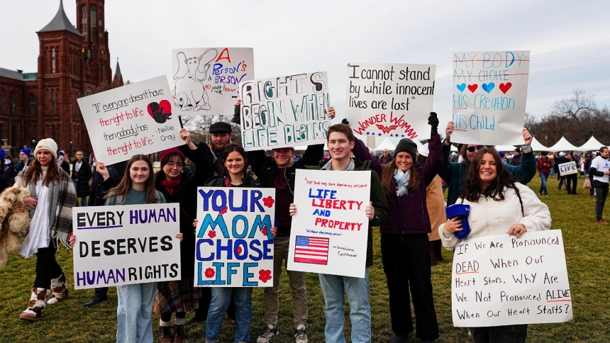 Young pro-life advocates display signs during the 53rd annual March for Life rally in Washington Jan. 23, 2026. (OSV News photo/Aaron Schwartz, Reuters)