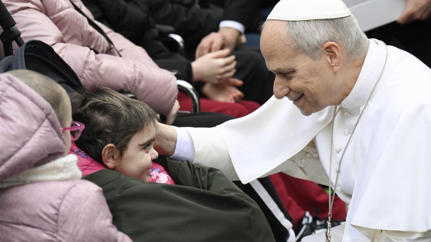 Pope Leo XIV greets a child in the Lourdes Grotto at the Vatican Gardens on the World Day of the Sick Feb. 11, 2026. (OSV News photo/Simone Risoluti, Vatican Media)