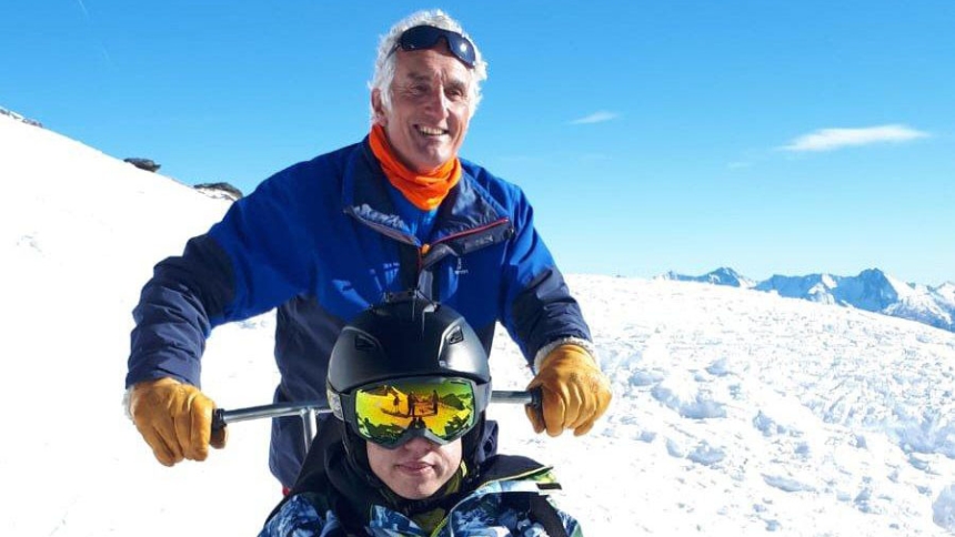 Father Geoffroy Génin, a 69-year-old French priest, helps a disabled woman ski down the slopes in Val Cenis, France in this undated photo. Father Génin spends one day a week offering chairlift confessions for skiers in the Alps. (OSV News photo/courtesy Father Génin)