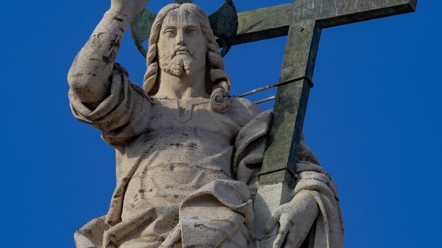 A statue of the Risen Christ on top of the facade of St. Peter's Basilica at the Vatican is seen in a Nov. 13, 2024, photo. (CNS photo/Pablo Esparza)