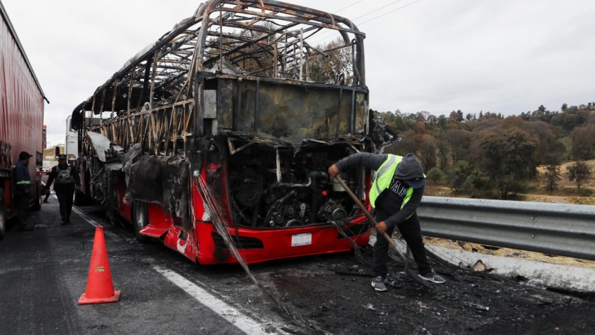 A burned bus is seen Feb. 22, 2026, at the site of a highway in Santa Rita Tlahuapan, Mexico, that connects Mexico City with the state of Puebla. Members of organized crime in several states put up roadblocks and carried out arson attacks after a military operation in which Mexican drug lord Nemesio Oseguera, known as "El Mencho," was killed in Tapalpa in Mexico's Jalisco state. (OSV News photo/Paola Garcia, Reuters)