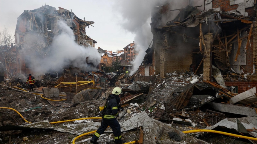 Firefighters work at the site of a residential building damaged during Russian drone and missile strikes in Kyiv, Ukraine, Feb. 22, 2026. (OSV News photo/Valentyn Ogirenko, Reuters)
