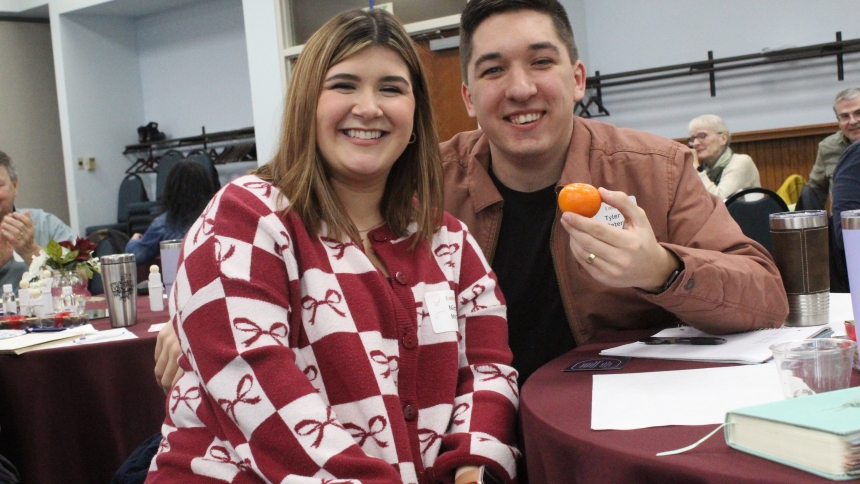 Married just over a year, Nicole McCaffery and Tyler Peters, of Kouts, matched all 34 answers in the Raise the Shoe Game to demonstrate how well they know each other at the Married Couples Retreat hosted by the Diocese of Gary on Feb. 14 at St. Paul in Valparaiso. The questions included “Who is the most religious?” and “Who is the most stubborn?” as well as more humorous queries like “Who has the better fashion sense?” (Marlene A. Zloza photo)