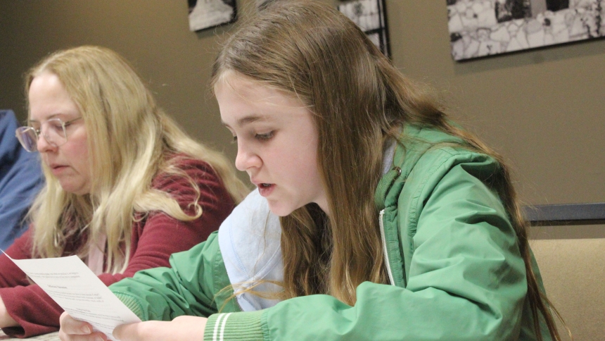 Hannah Fagen, 13, takes a turn reading a faith formation lesson on the third beatitude, “Blessed are the Meek, For They Shall Inherit the Earth,” during the Jan. 22 meeting of the new Carlos Acutis Franciscan Youth Group at Holy Name of Jesus in Cedar Lake. (Marlene A. Zloza photo)
