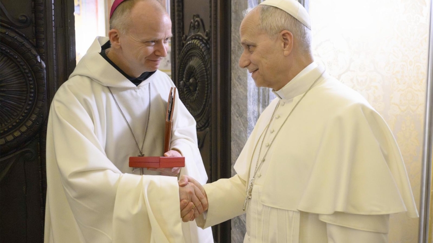 Pope Leo XIV greets Norwegian Bishop Erik Varden of Trondheim after the bishop led the final day of the Roman Curia's annual Lenten retreat in the Pauline Chapel at the Vatican Feb. 27, 2026. The Norwegian bishop was chosen by Pope Leo to preach at the Feb. 22-27 Lenten retreat, which reflected on the theme, "Illuminated by a Hidden Glory." (OSV News photo/Simone Risoluti, Vatican Media)