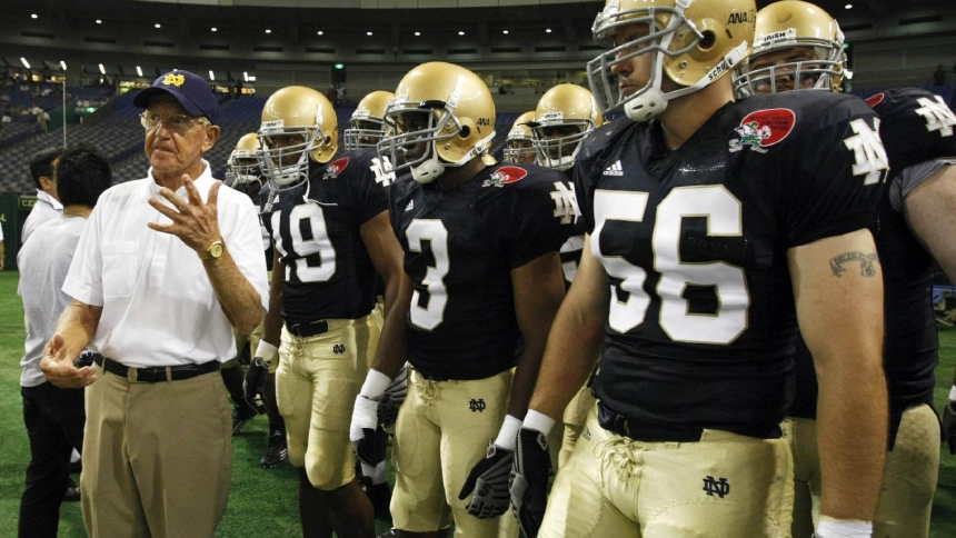 Notre Dame alumni coach Lou Holtz speaks to his team before the start of the Notre Dame Japan Bowl football game against Japan in Tokyo July 25, 2009. Holtz, a legendary college football coach and devout Catholic who led the University of Notre Dame to the 1988 National Championship, died March 4, 2026, at age 89. (OSV News photo/Issei Kato, Reuters)