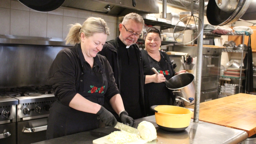 Zosia Podczerwinski (left) and her sister-in-law Stasia Podczerwinski start preparations for the catered Easter Sunday meals under the watchful eye of Father Irek Bem in the kitchen at the Our Lady of Czestochowa Shrine in Merrillville. Orders for the meals, 10 and up, must be made by April 1. (Marlene A. Zloza photo)