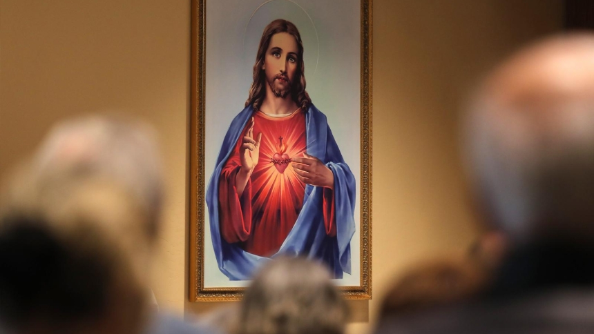 A painting of the Sacred Heart of Jesus is seen during Palm Sunday Mass at Sacred Heart Church in Prescott, Ariz., April 13, 2025. (OSV News photo/Bob Roller)