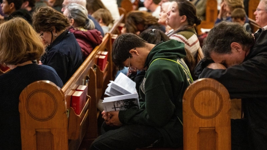 Worshippers pray inside St. Patrick Catholic Church following a Way of the Cross procession on Good Friday in Washington April 3, 2026. (OSV News photo/Annabelle Gordon, Reuters)