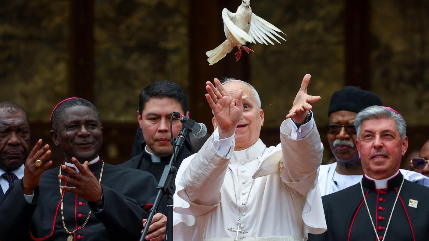 Pope Leo XIV releases a dove after he attended a Meeting for Peace at St. Joseph's Cathedral in Bamenda, Cameroon, April 16, 2026. (OSV News photo/Guglielmo Mangiapane, Reuters)