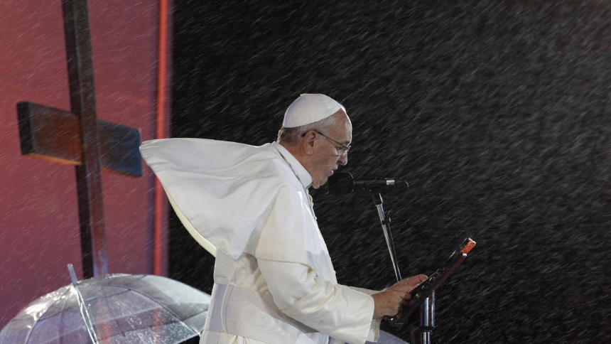 Rain falls as Pope Francis speaks during the World Youth Day welcome ceremony on Copacabana beach in Rio de Janeiro in this July 25, 2013, file photo. Pope Francis, formerly Argentine Cardinal Jorge Mario Bergoglio, died April 21, 2025, at age 88 (CNS photo/Paul Haring)