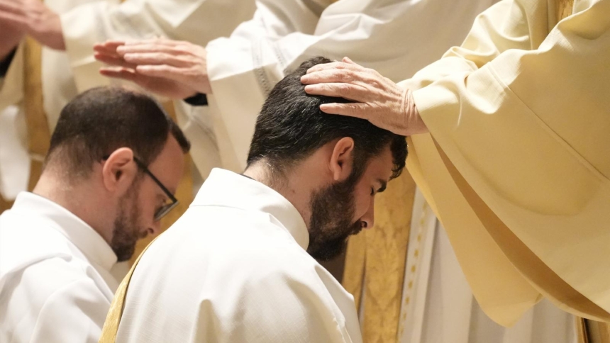 A priest lays hands on Deacon Kieran Halloran during his ordination to the priesthood at St. Ignatius Loyola Church in New York City June 14, 2025. A new report from the Center for Applied Research in the Apostolate at Georgetown University, conducted for the U.S. bishops, looks at the defining features of the more than 400 men who will be ordained to the priesthood in 2026. (OSV News photo/Gregory A. Shemitz)
