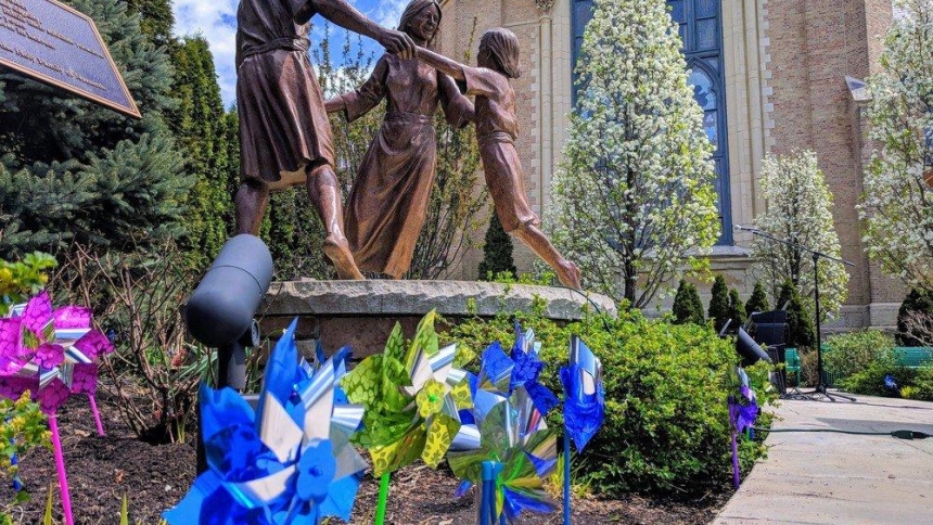 Pinwheels are seen planted in the Chicago Healing Garden in this 2014 photo. Plans for a similar garden are underway at The Catholic University of America in Washington, with organizers hoping to raise $200,000 by spring 2027 to fund an area to include the flowers, shrubbery, seating, plaques and a prayer labyrinth. Such gardens can be found all around the country and aim to bring healing to victim/survivors of abuse. (OSV News photo/courtesy of St. Ignatius College Prep)